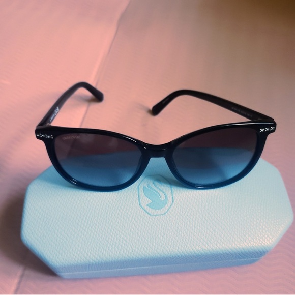 Swarovski Accessories - NWOT Swarovski Gradient Smoke Oval Black Ladies Sunglasses with Crystal Detail